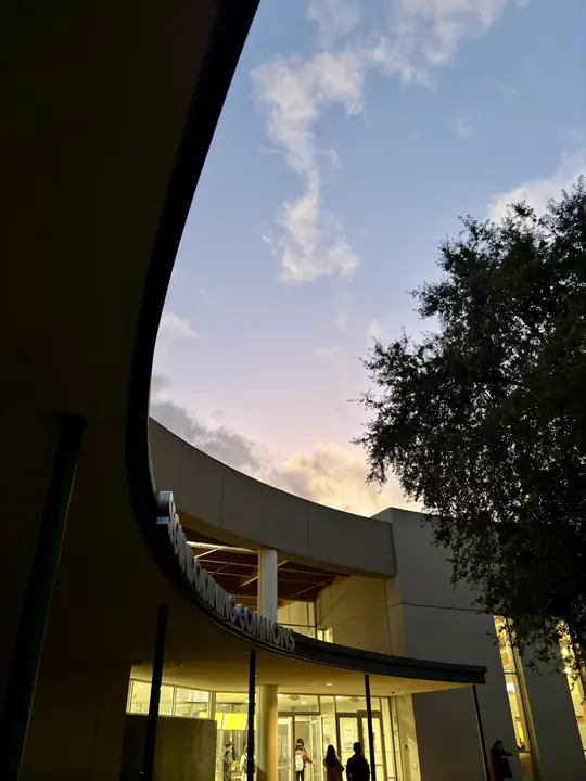 Golden dusk embraces the building, a tranquil evening glow, whispering promises of rest and quiet reflection. Let me know if you'd like another option!